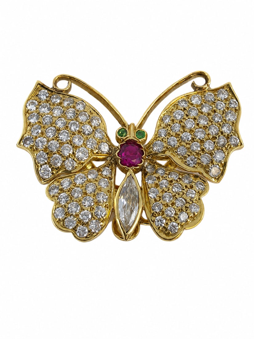 ELEGANT DIAMOND AND RUBY BUTTERFLY BROOCH: ELEGANT DIAMOND AND RUBY BUTTERFLY BROOCH 9.7 grams 18 ct bright lively diamonds approx 2.50 ct vibrant ruby in excellent condition L 2.3 cm W 3 cm