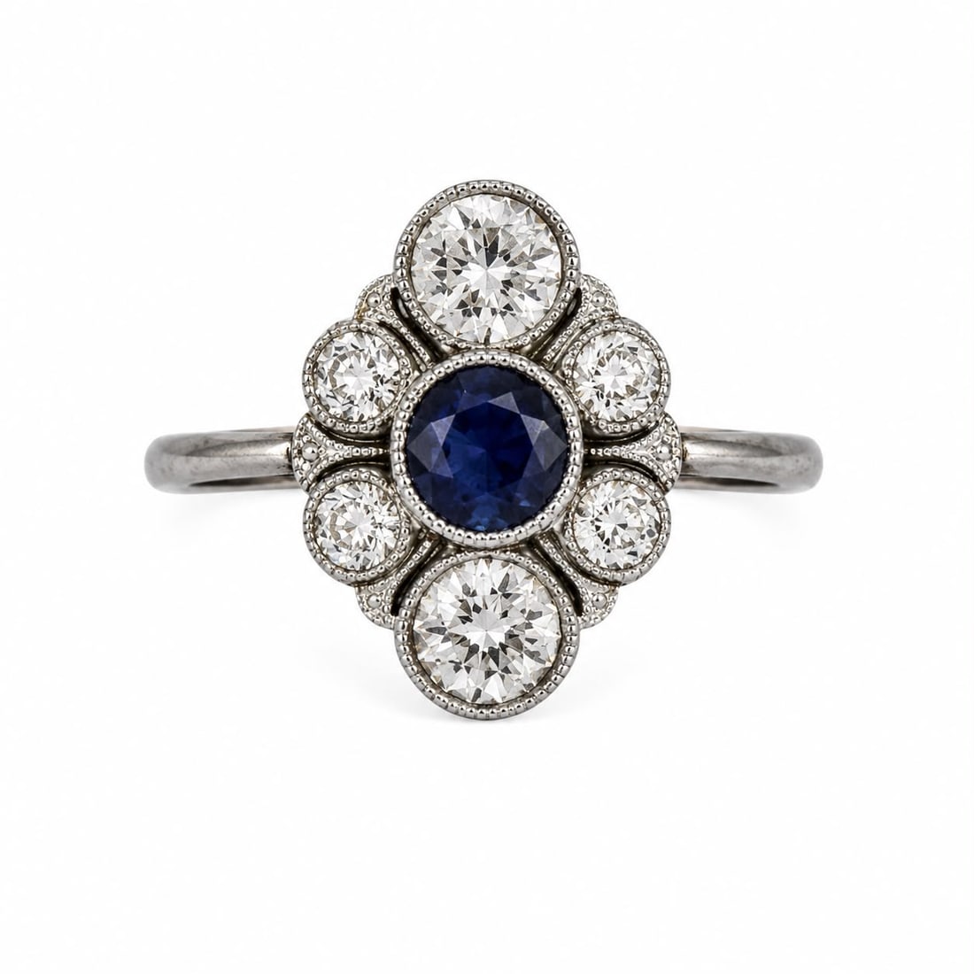 SAPPHIRE AND DIAMOND RING: SAPPHIRE AND DIAMOND RING,3,3 grams, testing 18 ct. gold.Rich and vibrant sapphire.Bright and lively old cut diamonds.Size P 1/2.