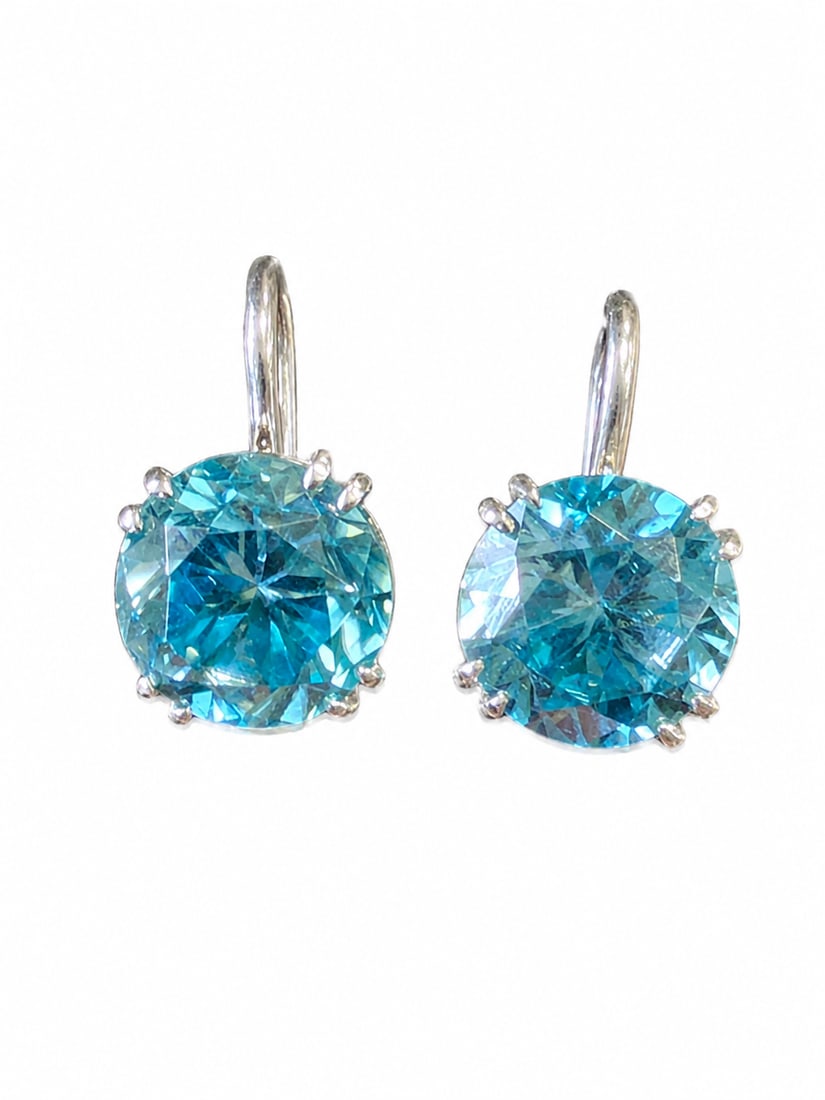 PAIR OF GOLD ZIRCON EARRINGS: PAIR OF GOLD ZIRCON EARRINGS 3.4 grams vibrant zircons with no abrasions approx 6.43 ct L 1.2 cm