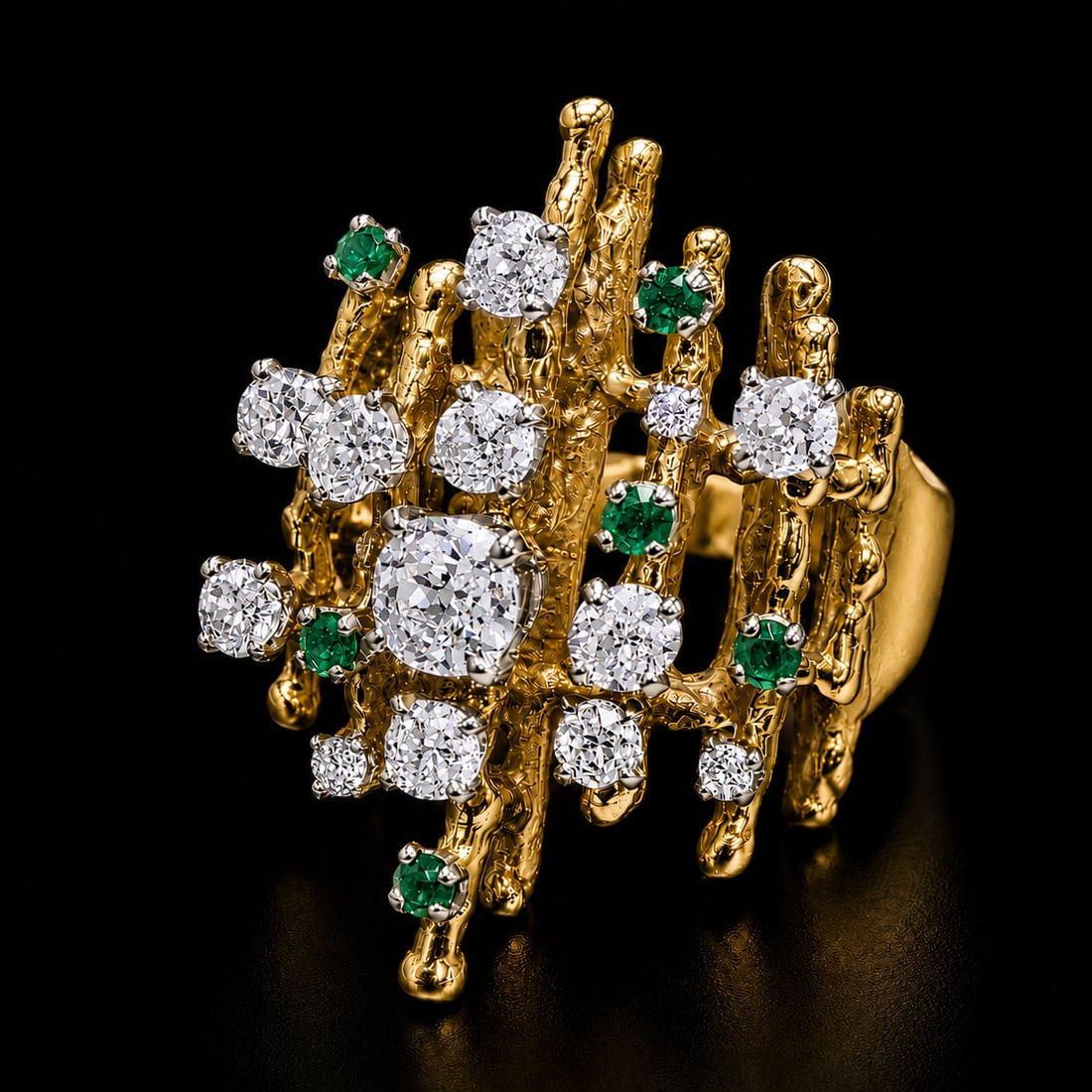 ABSTRACT MODERNIST EMERALD AND DIAMOND RING: ABSTRACT MODERNIST EMERALD AND DIAMOND RING,14.1 grams, testing high carat gold.Bright and lively old cut diamonds.Rich and vibrant emeralds.Size O.