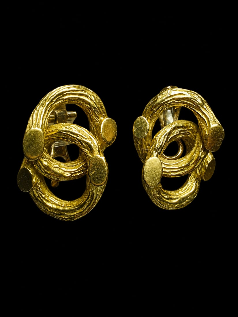 BOUCERON, PAIR OF EARRINGS: BOUCERON, PAIR OF EARRINGS,15.8 grams, 18 ct. gold.Of interlocking design, with bark texture.Signed Boucheron.L. 2.4 cm.