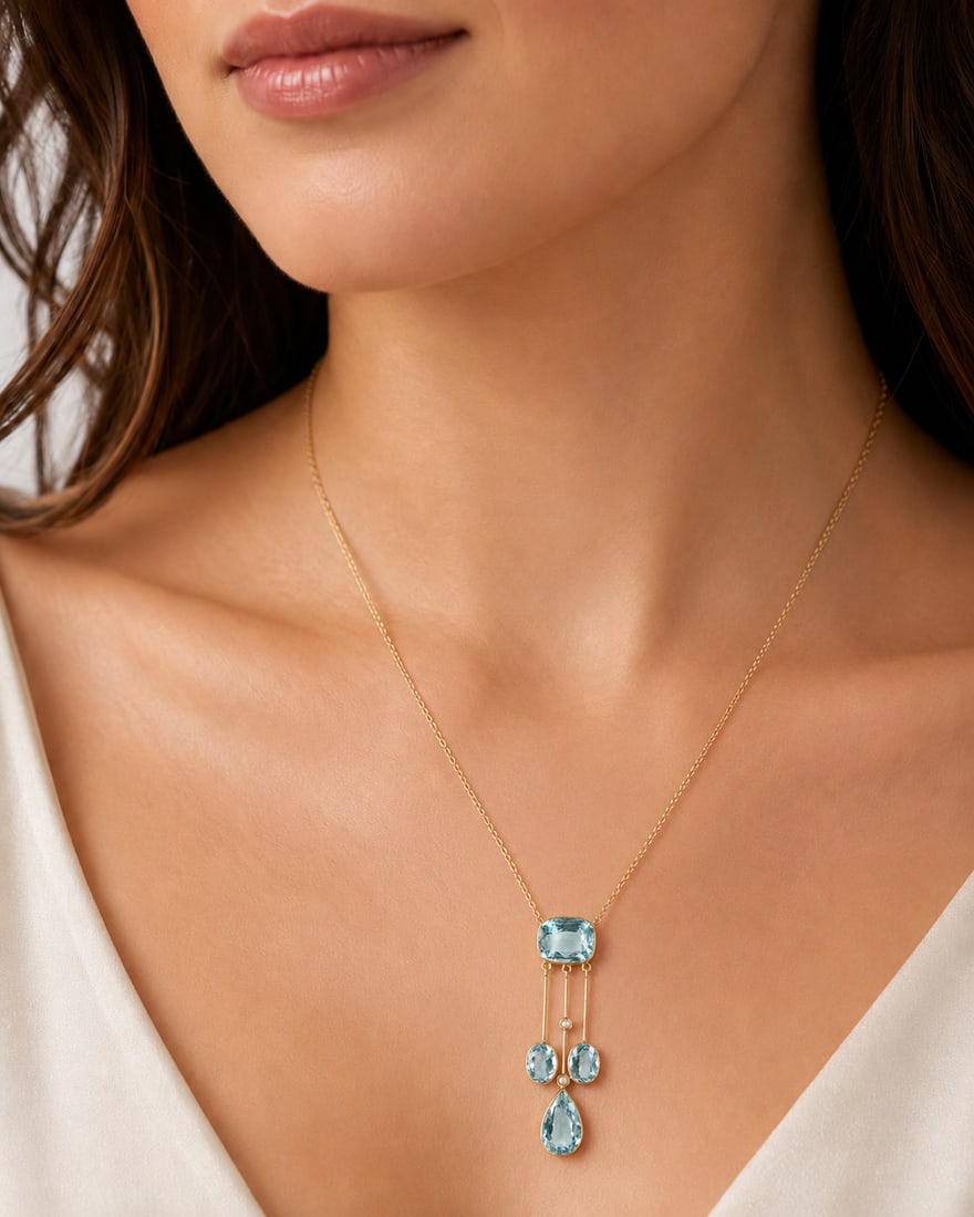 ELEGANT AQUAMARINE AND PEARL PENDANT NECKLACE: ELEGANT AQUAMARINE AND PEARL PENDANT NECKLACE 5 grams high carat gold vibrant matching aquamarines in great condition pendant L 4.6 cm chain L 39 cm