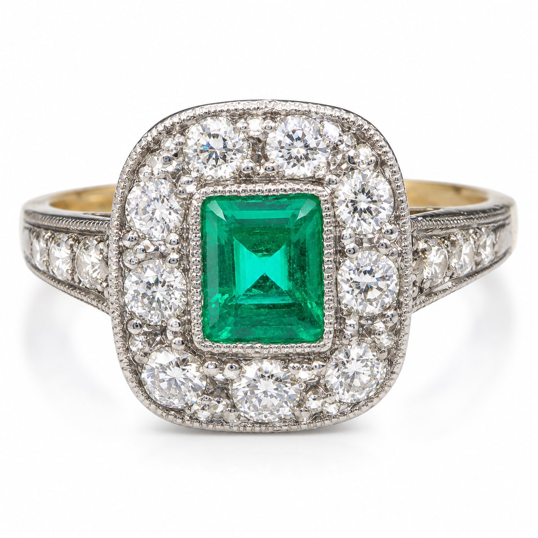 EMERALD AND DIAMOND CLUSTER RING: EMERALD AND DIAMOND CLUSTER RING,3,2 grams, testing high carat gold.Rich and vibrant emerald.Diamonds bright and lively.Size M.