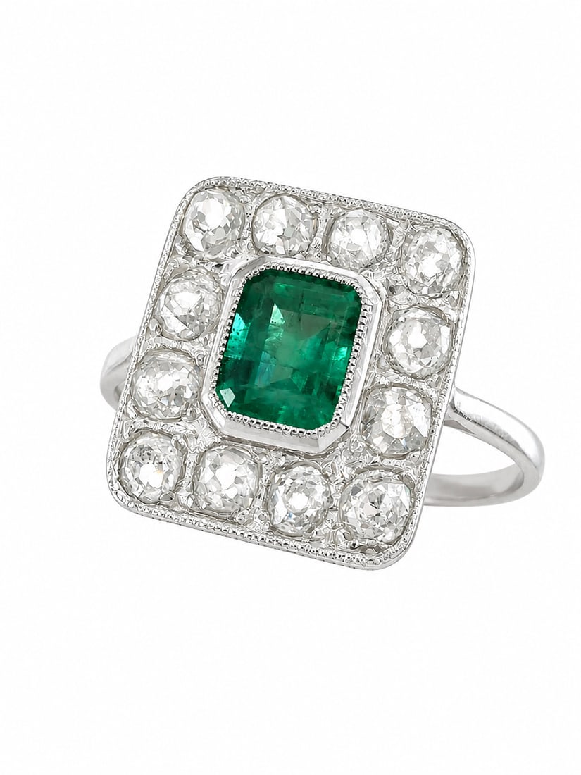 EMERALD AND DIAMOND CLUSTER RING: EMERALD AND DIAMOND CLUSTER RING,testing platinum.Rich and vibrant emerald.Diamonds bright and lively.Size L.