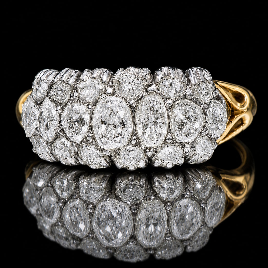 ANTIQUE DIAMOND RING: ANTIQUE DIAMOND RING,testing 18 ct. gold and silver.Bright and lively diamonds.Size N 1/2.