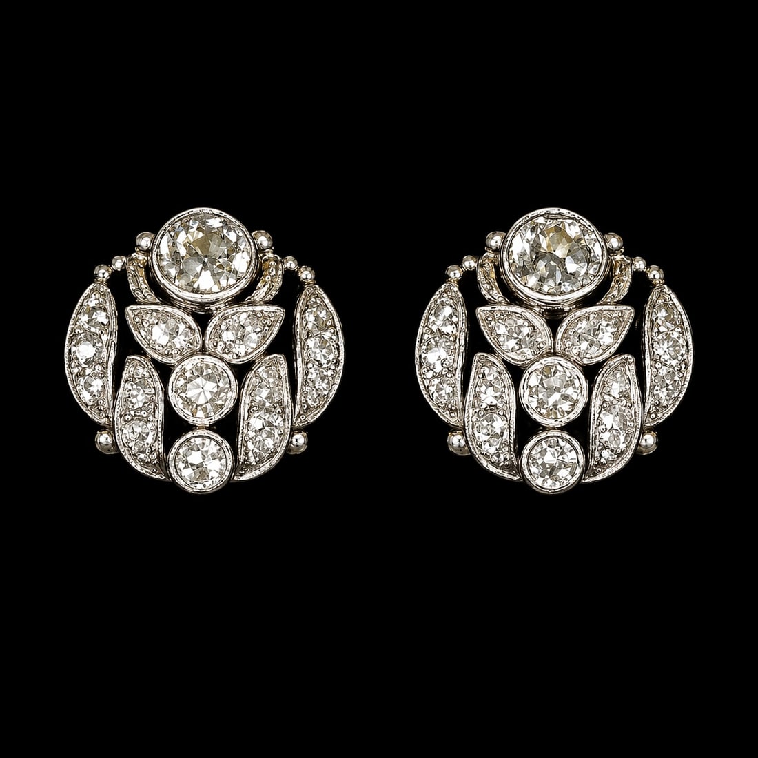 FINE PAIR OF EDWARDIAN DIAMOND EARRINGS: FINE PAIR OF EDWARDIAN DIAMOND EARRINGS,7.1 grams, testing platinum.Bright and lively old cut diamonds, totalling approx. 2.20 ct.W. 1.5 cm.