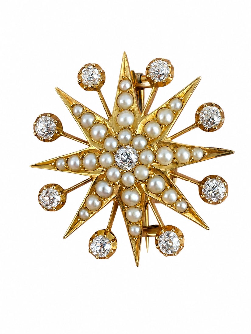 ANTIQUE DIAMOND AND PEARL STAR BURST BROOCH: ANTIQUE DIAMOND AND PEARL STAR BURST BROOCH 8.4 grams high carat gold bright lively old cut diamonds in excellent condition 2.8 cm diameter