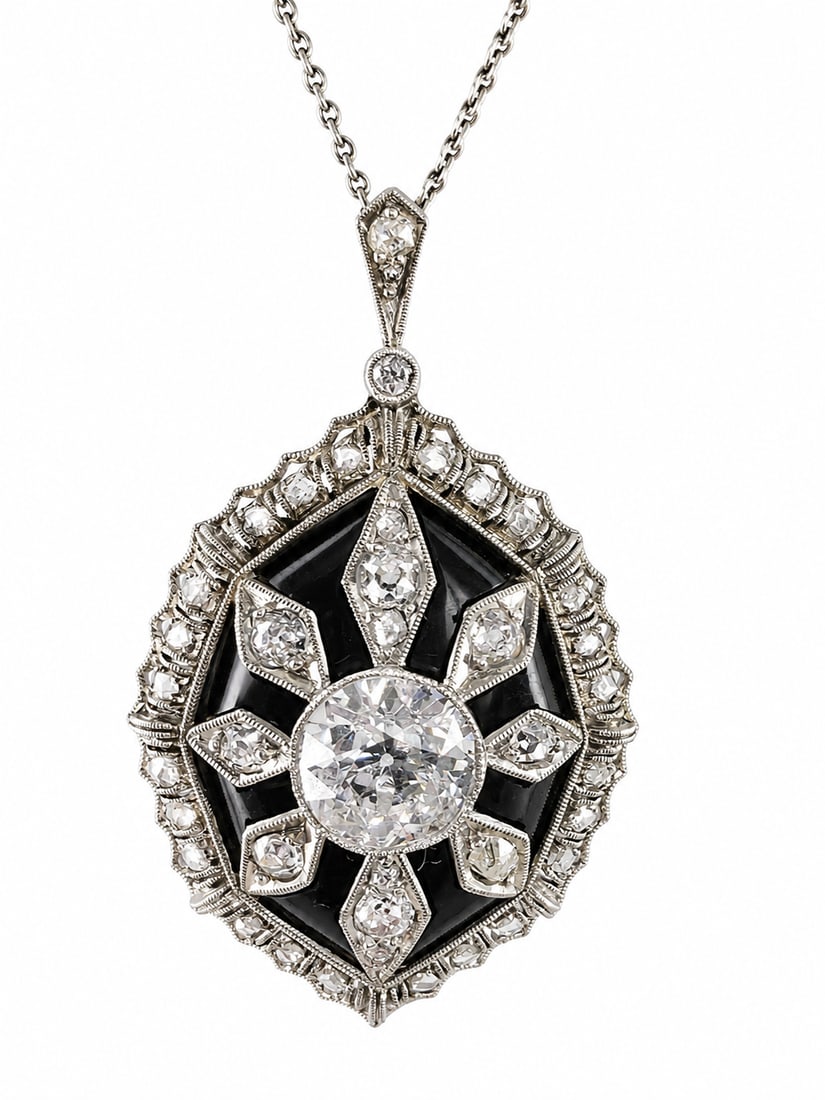 ELEGANT ART DECO DIAMOND AND ONYX PENDANT NECKLACE: ELEGANT ART DECO DIAMOND AND ONYX PENDANT NECKLACE 8.1 grams platinum and high carat gold bright lively old cut diamonds principle stone approx. 1.40 ct.in excellent condition pendant L 3.5 cm chain L