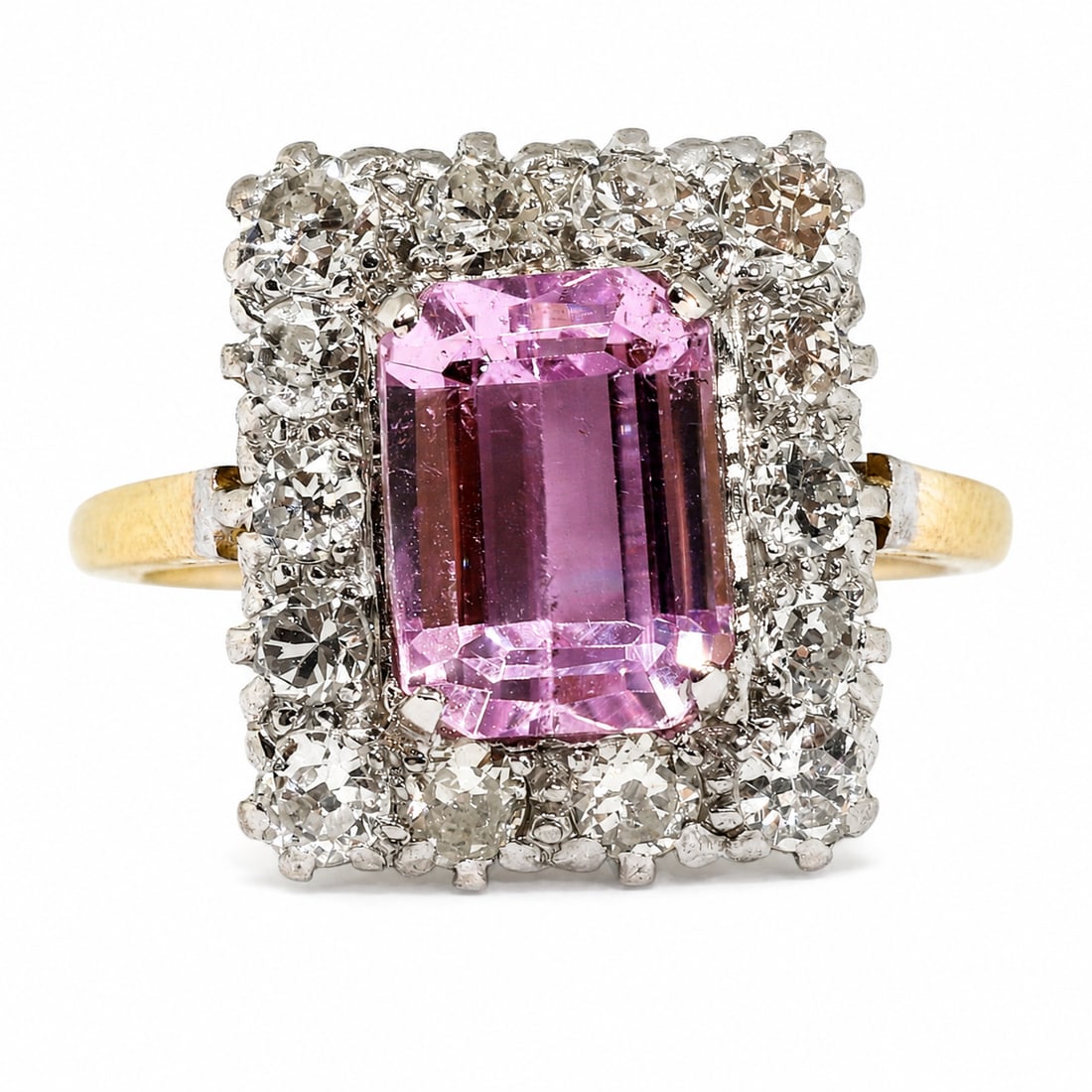 FINE KUNZITE AND DIAMOND CLUSTER RING: FINE KUNZITE AND DIAMOND CLUSTER RING,6,2 grams, 18 ct. gold.Rich and vibrant kunzite of approx. 3.60 ct.Diamonds bright and lively, totalling approx. 1.70 ct.Size M.