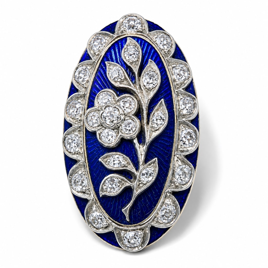 GEORGIAN DIAMOND AND ENAMEL LOCKET BACK RING: GEORGIAN DIAMOND AND ENAMEL LOCKET BACK RING,11.5 grams, testing high carat gold.Diamonds bright and lively, with a diamond set flower to the centre and further diamond border.Locket back.L. head 3.3 