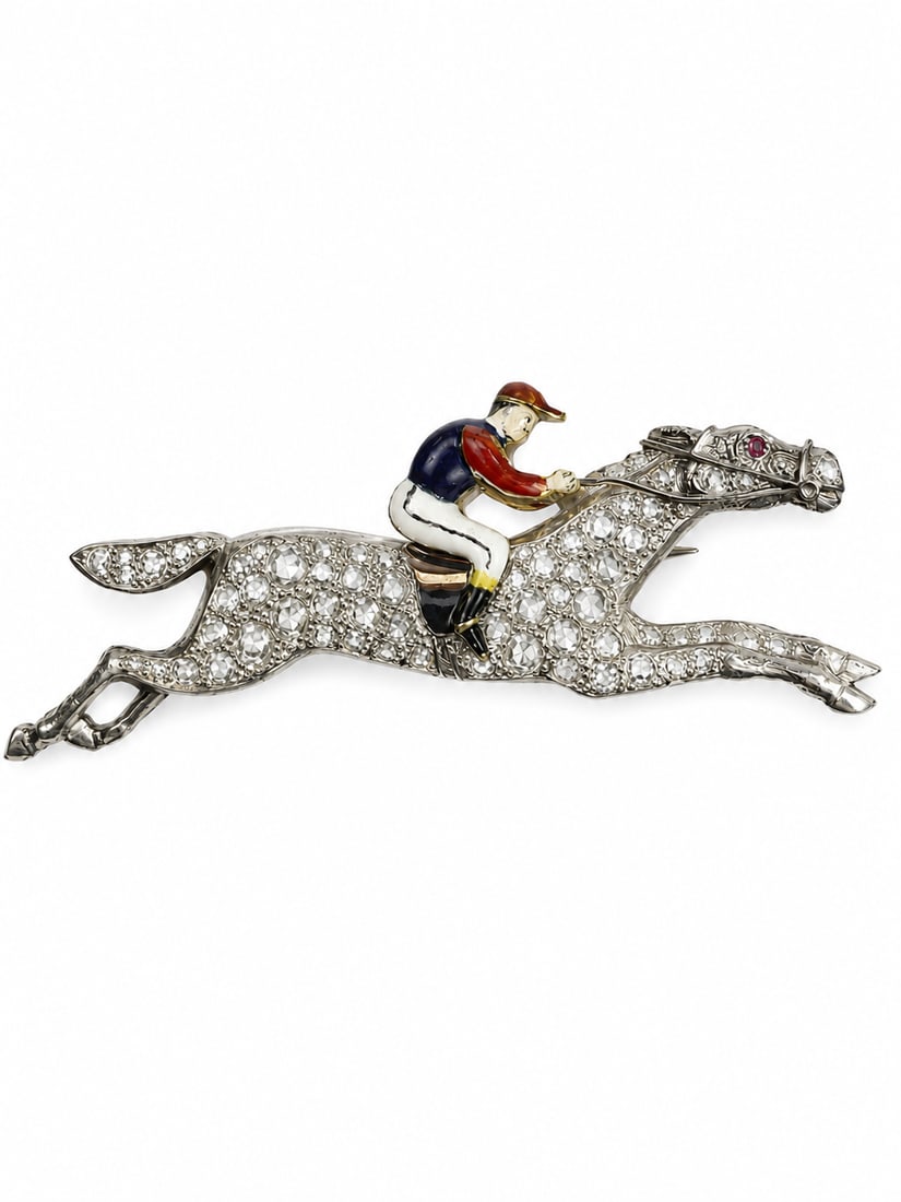 ANTIQUE ENAMEL AND DIAMOND HORSE AND JOCKEY BROOCH: ANTIQUE ENAMEL AND DIAMOND HORSE AND JOCKEY BROOCH,9.8 grams, testing platinum.Diamonds bright and lively.Lovely multi colour enamel.L. 4.9 cm.Equestrian interest.