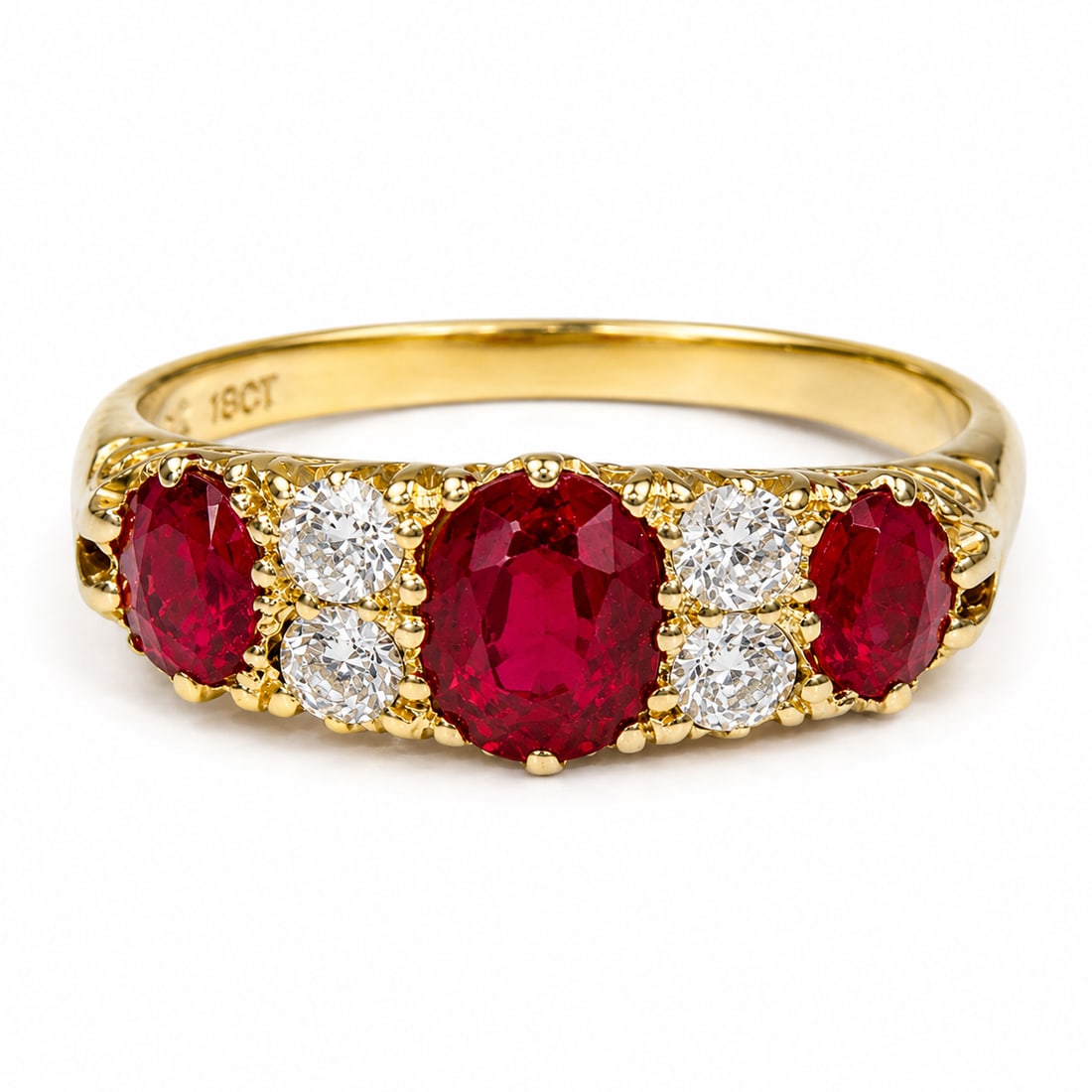 RUBY AND DIAMOND 7-STONE RING: RUBY AND DIAMOND 7-STONE RING 3.2 grams high carat gold rich vibrant rubies with no abrasions bright lively old cut diamonds size O