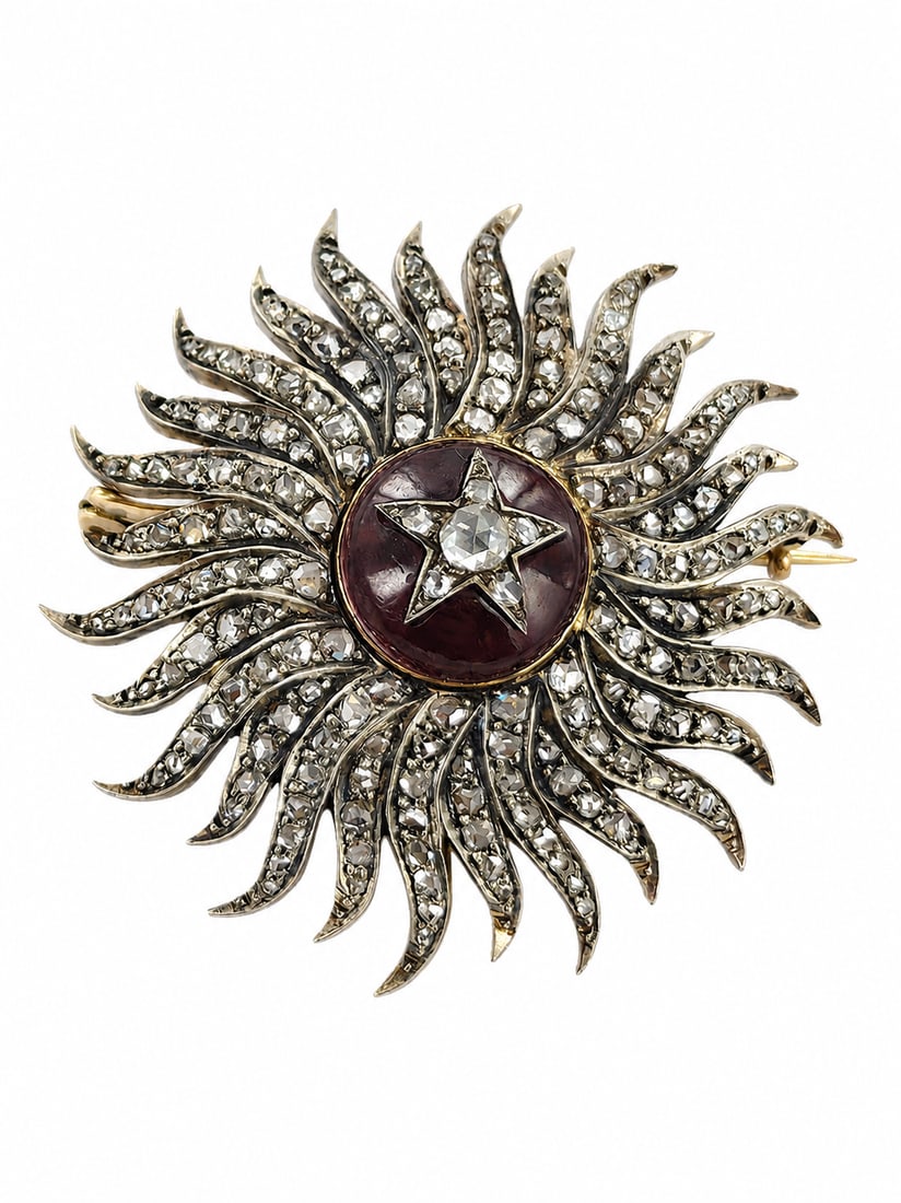 VICTORIAN STARBURST DIAMOND AND GARNET BROOCH: VICTORIAN STARBURST DIAMOND AND GARNET BROOCH 17.6 grams lively diamonds approx 2.30 ct fine craftsmanshipin great condition 4.9 cm diameter