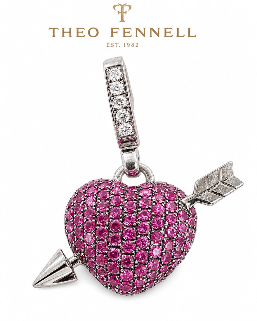 THEO FENNELL PINK SAPPHIRE AND DIAMOND HEART AND ARROW PENDANT: THEO FENNELL PINK SAPPHIRE AND DIAMOND HEART AND ARROW PENDANT6.5 grams signed Theo Fennell 18 ct vibrant matching pink sapphires lively diamonds