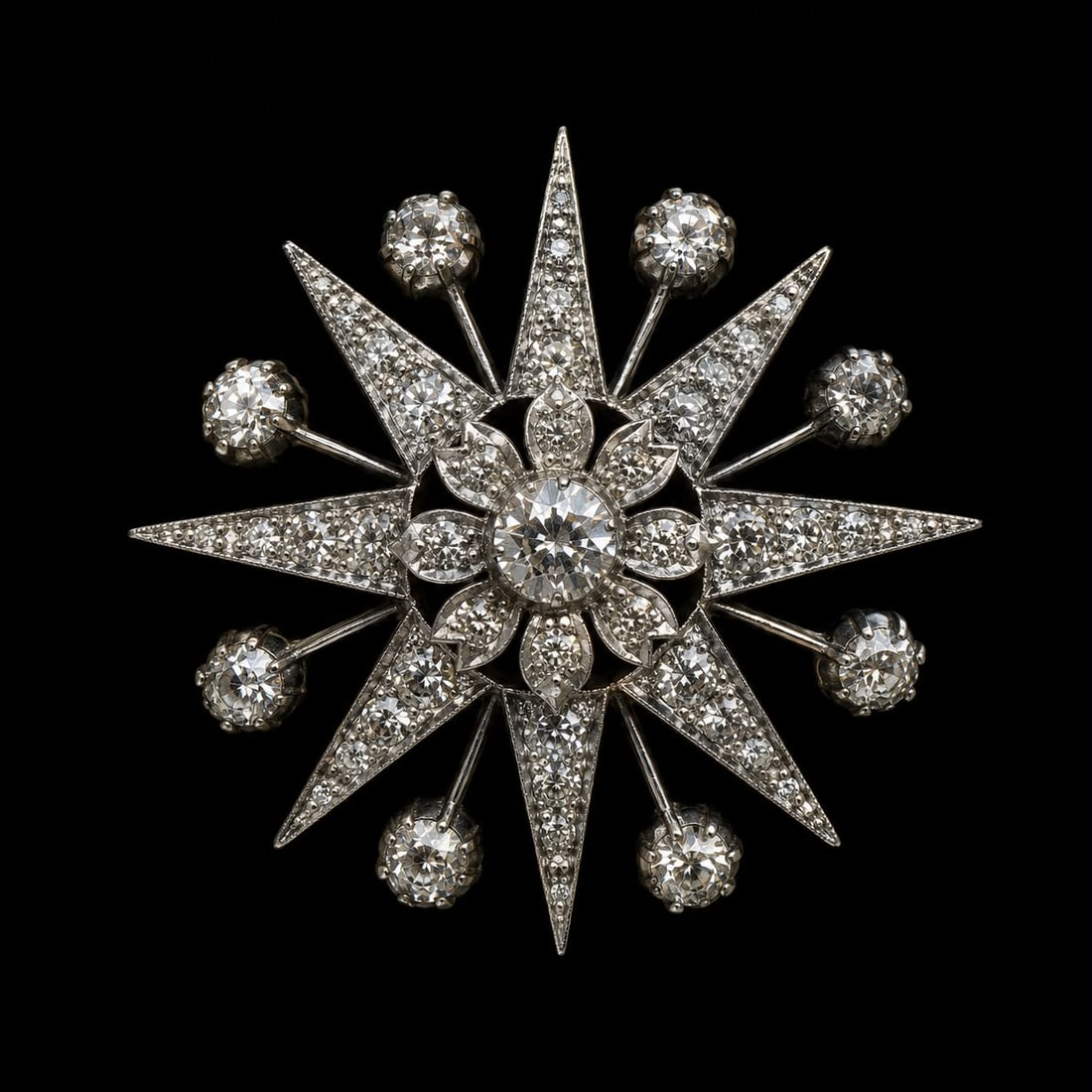 VICTORIAN DIAMOND STAR BROOCH: VICTORIAN DIAMOND STAR BROOCH 6.7 grams bright lively old cut diamonds approx 2 ct3.3 cm diameter in great condition
