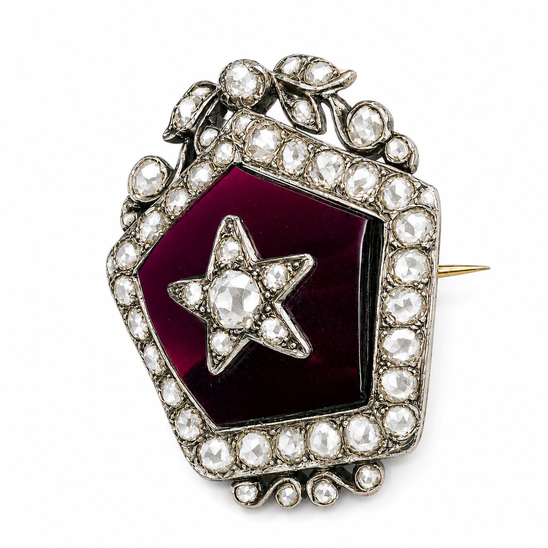 VICTORIAN DIAMOND AND GARNET BROOCH: VICTORIAN DIAMOND AND GARNET BROOCH,9.1 grams, testing 18 ct. gold and silver.Diamonds bright and lively, totalling approx. 2 ct.Lovely garnet.L. 2.9 cm.
