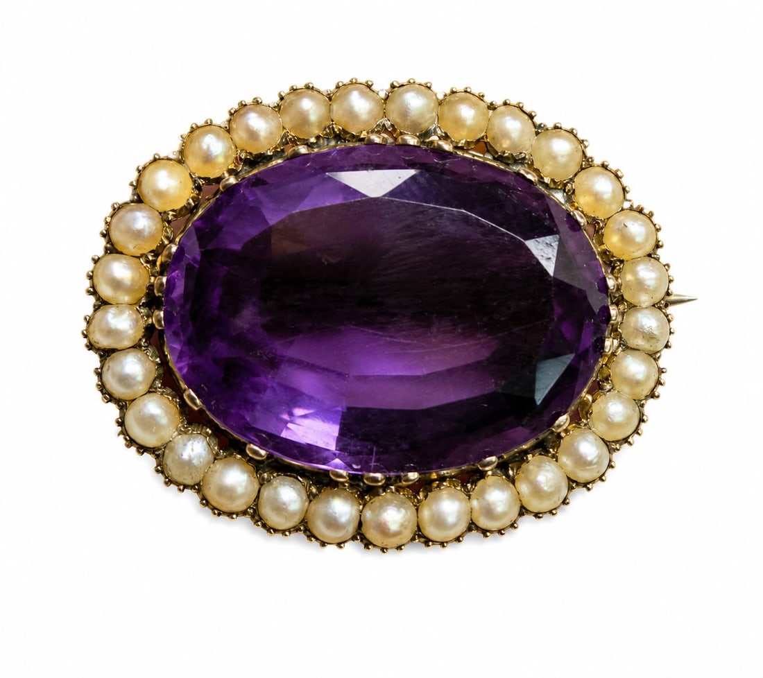 VICTORIAN AMETHYST AND PEARL BROOCH: VICTORIAN AMETHYST AND PEARL BROOCH,7.2 grams, testing high carat gold.Rich and vibrant amethyst.Lovely pearls.W. 2.8 cm.