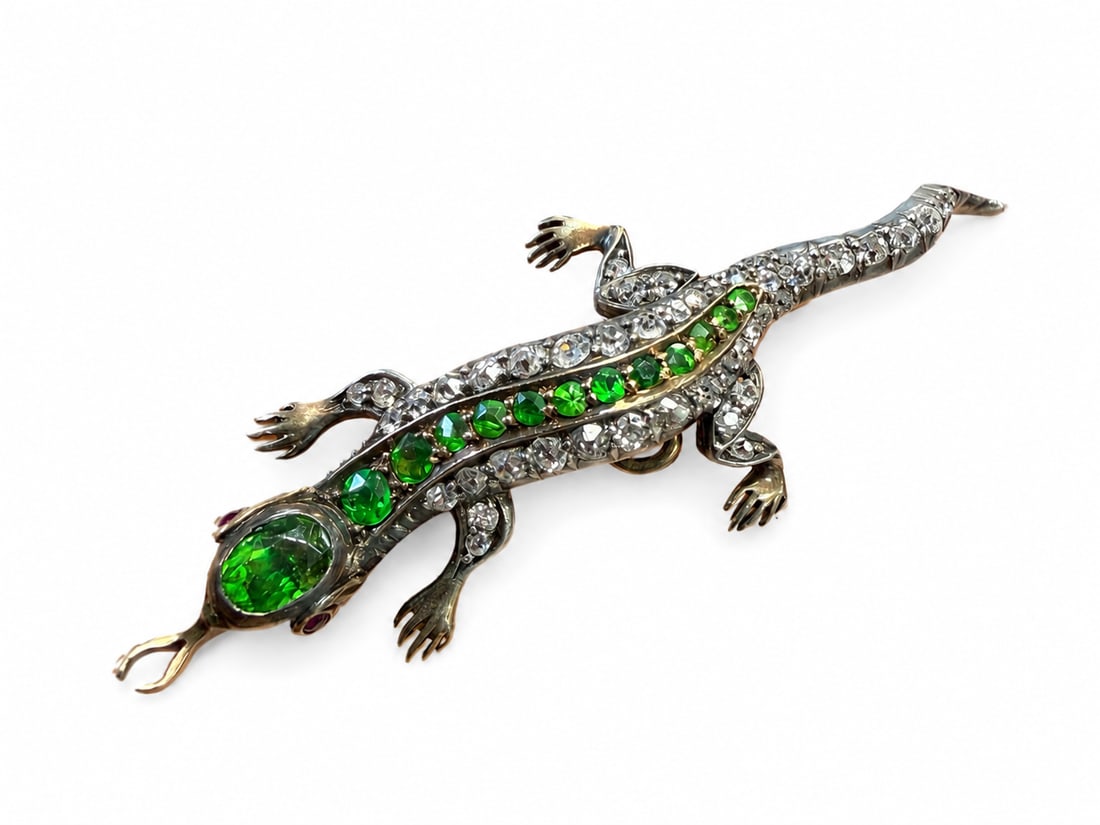 ALABASTER & WILSON, VICTORAIN DEMANTOID GARNET AND DIAMOND LIZARD BROOCH: ALABASTER & WILSON, VICTORAIN DEMANTOID GARNET AND DIAMOND LIZARD BROOCH,7.4 grams, testing high carat gold and silver.Rich and vibrant demantoid garnets.Diamonds bright and lively.Makers mark A&W.L.