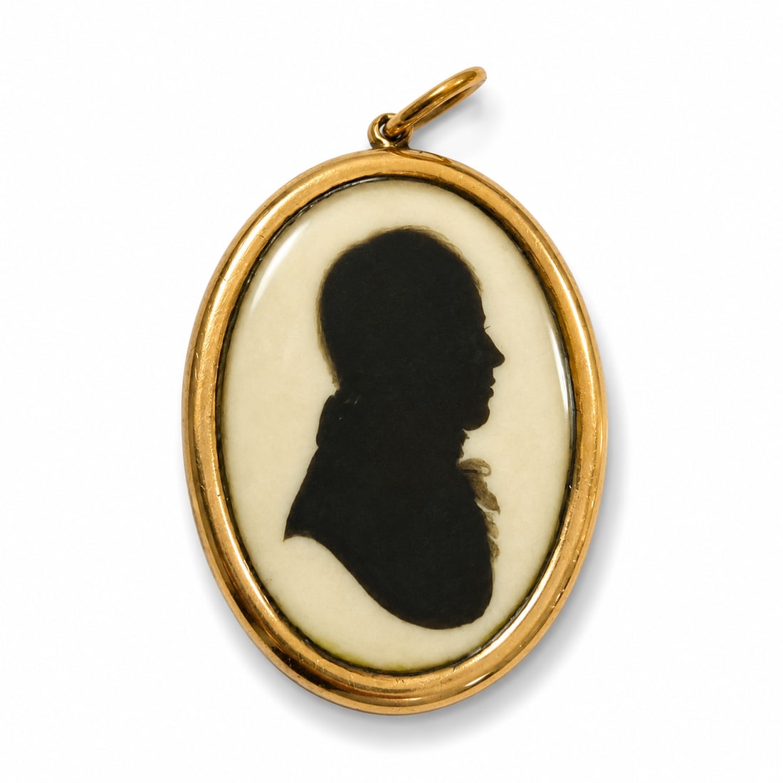 RARE AND UNUSUAL GEORGIAN DOUBLE SIDED SILHOUETTE GOLD PENDANT: RARE AND UNUSUAL GEORGIAN DOUBLE SIDED SILHOUETTE GOLD PENDANT,7.6 grams.The front depicting the bust of a woman.The back depicting the bust of a man.L. 3.8 cm.
