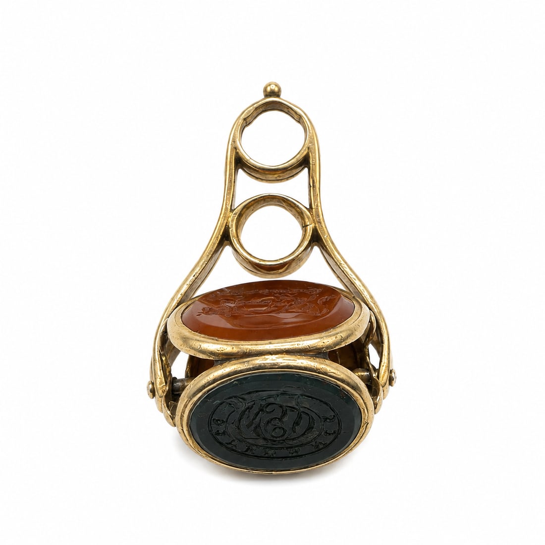 VICTORIAN GOLD THREE CARVED INTAGLIO FOB SEAL: VICTORIAN GOLD THREE CARVED INTAGLIO FOB SEAL 5.6 grams in great condition the carvings are clear and crisp L 3.4 cm