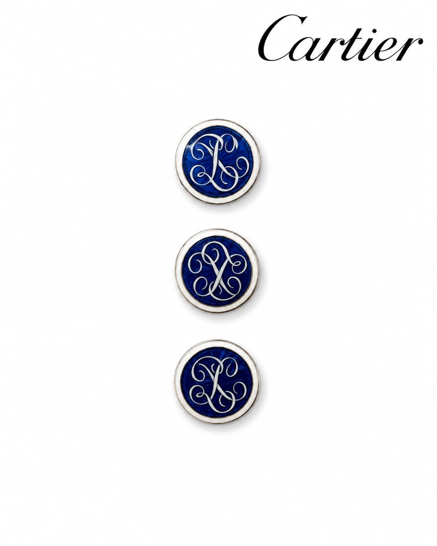 CARTIER PARIS, SET OF 3 ENAMEL DRESS BUTTONS: CARTIER PARIS, SET OF 3 ENAMEL DRESS BUTTONS,18 ct. gold.The buttons with white and royal blue enamel.Signed Cartier, Paris.In original Cartier box.Diam. 1.2 cm.