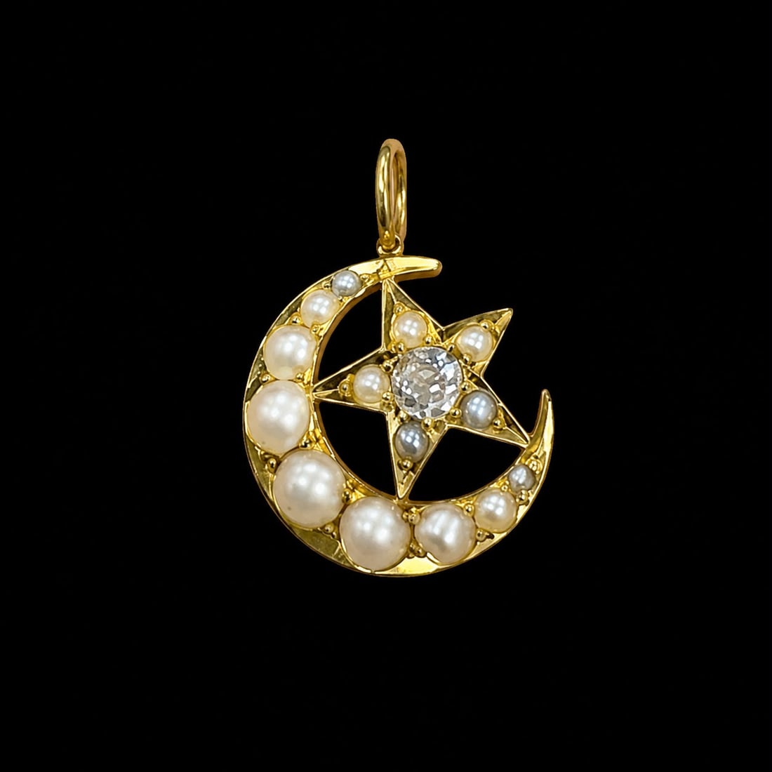 ANTIQUE PEARL AND DIAMOND STAR AND CRESCENT PENDANT: ANTIQUE PEARL AND DIAMOND STAR AND CRESCENT PENDANT,testing high carat gold.Bright and lively diamond.Lovely pearls.L. 1.9 cm.