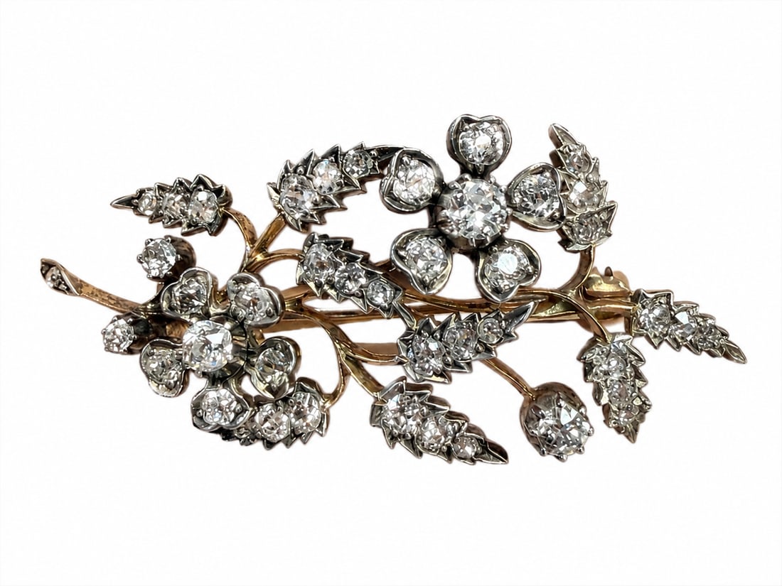 VICTORIAN DIAMOND SPRAY BROOCH: VICTORIAN DIAMOND SPRAY BROOCH,7.9 grams, testing high carat gold and silver.Diamonds bright and lively, totalling approx. 2.20 ct.L. 5.1 cm.