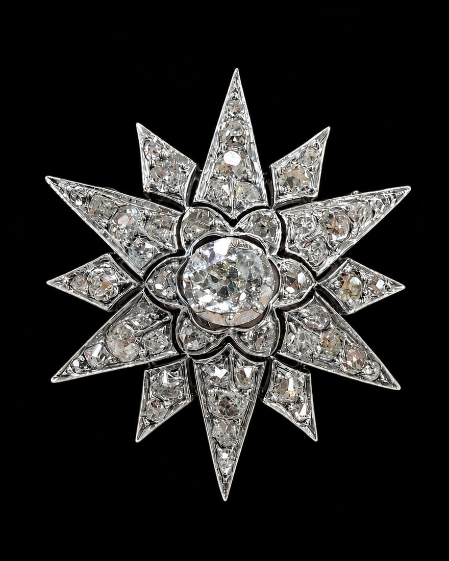 VICTORIAN DIAMOND STAR BROOCH: VICTORIAN DIAMOND STAR BROOCH,6.6 grams, testing high carat gold.Bright and lively diamonds.W. 3.3 cm.