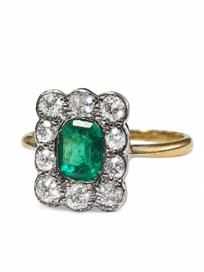 EMERALD AND DIAMOND CLUSTER RING: EMERALD AND DIAMOND CLUSTER RING,testing high carat gold.Rich and vibrant emerald.Diamonds bright and lively.Size J 1/2.