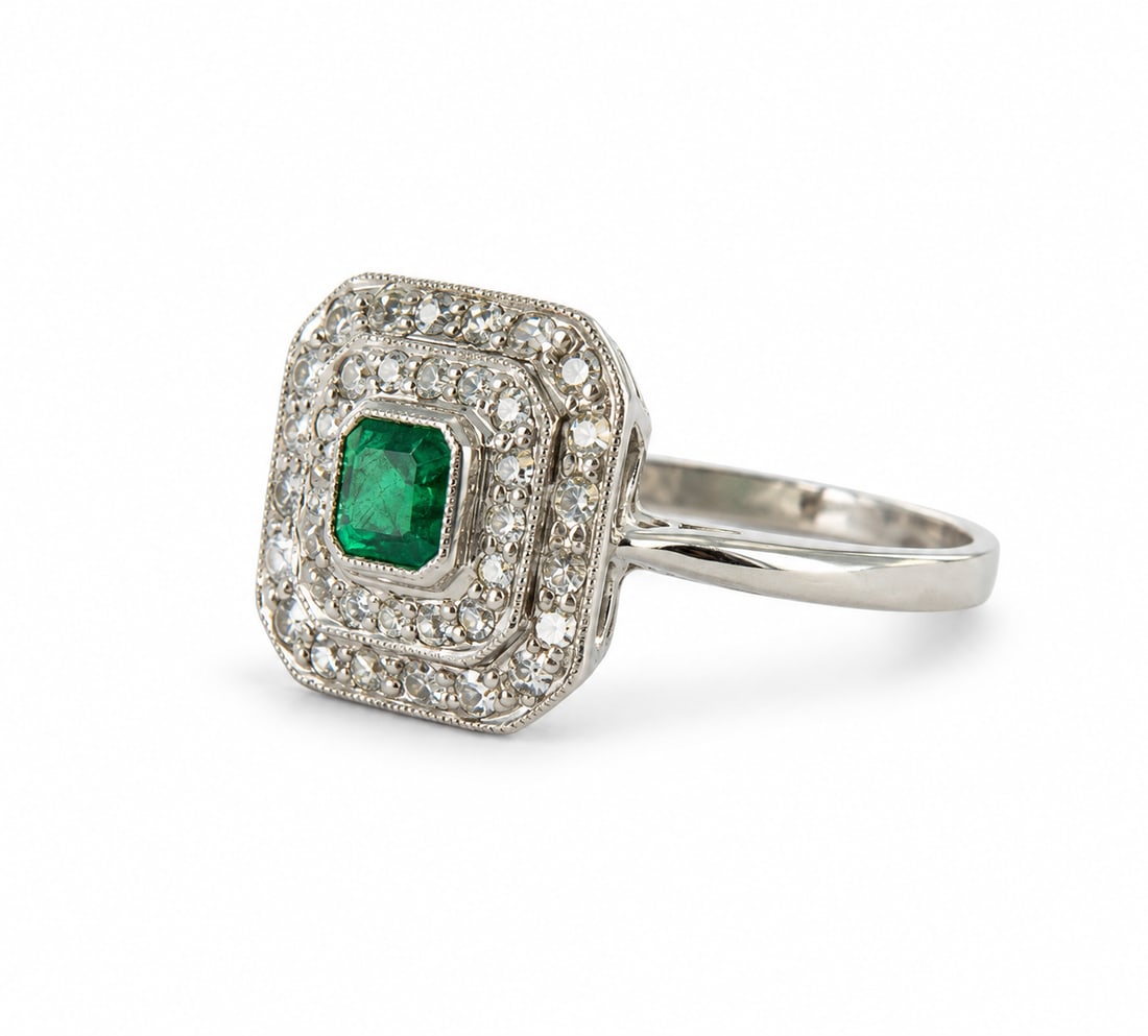 ART DECO EMERALD AND DIAMOND CLUSTER RING: ART DECO EMERALD AND DIAMOND CLUSTER RING.Set with vibrant rich colour emerald and bright and lively diamonds.Size L 1/23.2 grams