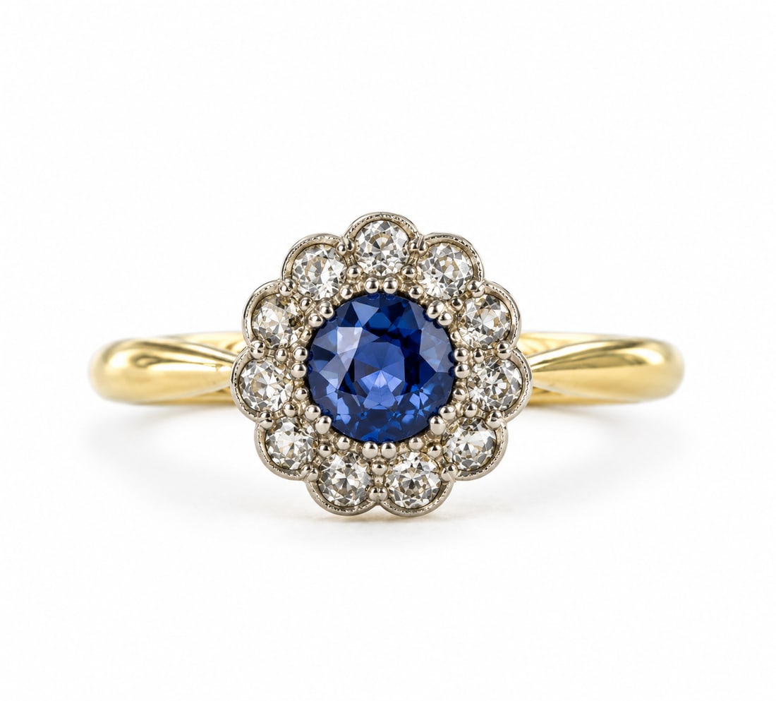 SAPPHIRE AND DIAMOND CLUSTER RING: SAPPHIRE AND DIAMOND CLUSTER RING,18 ct. gold.Vibrant sapphire.bright and lively diamonds.Size N 1/2.