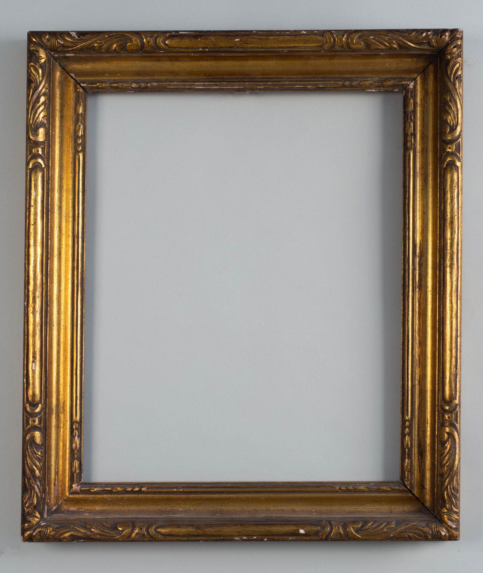 Arts & Crafts Gilt Frame: American, ca. 1920, hand carved and gilded, possibly made by Newcomb Macklin. Rabbet: 13" x 16" Overall Dimensions: 17.5" x 20.5" Molding Width: 2.5"