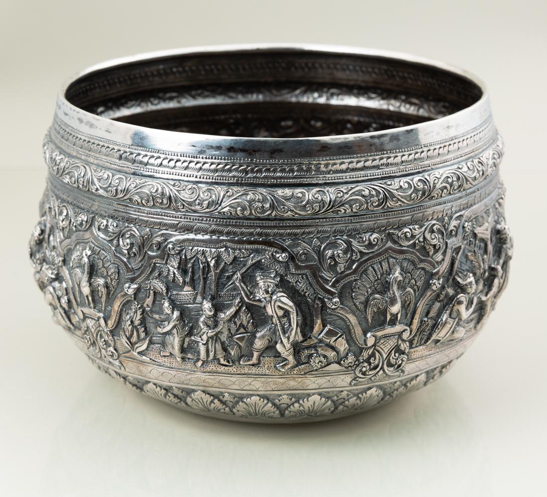 Burmese Silver Beggars Bowl: Hand chased with Traditional Scenes. Unmarked but tested and guaranteed. 6 1/4" x 4 1/4. 14.5 troy