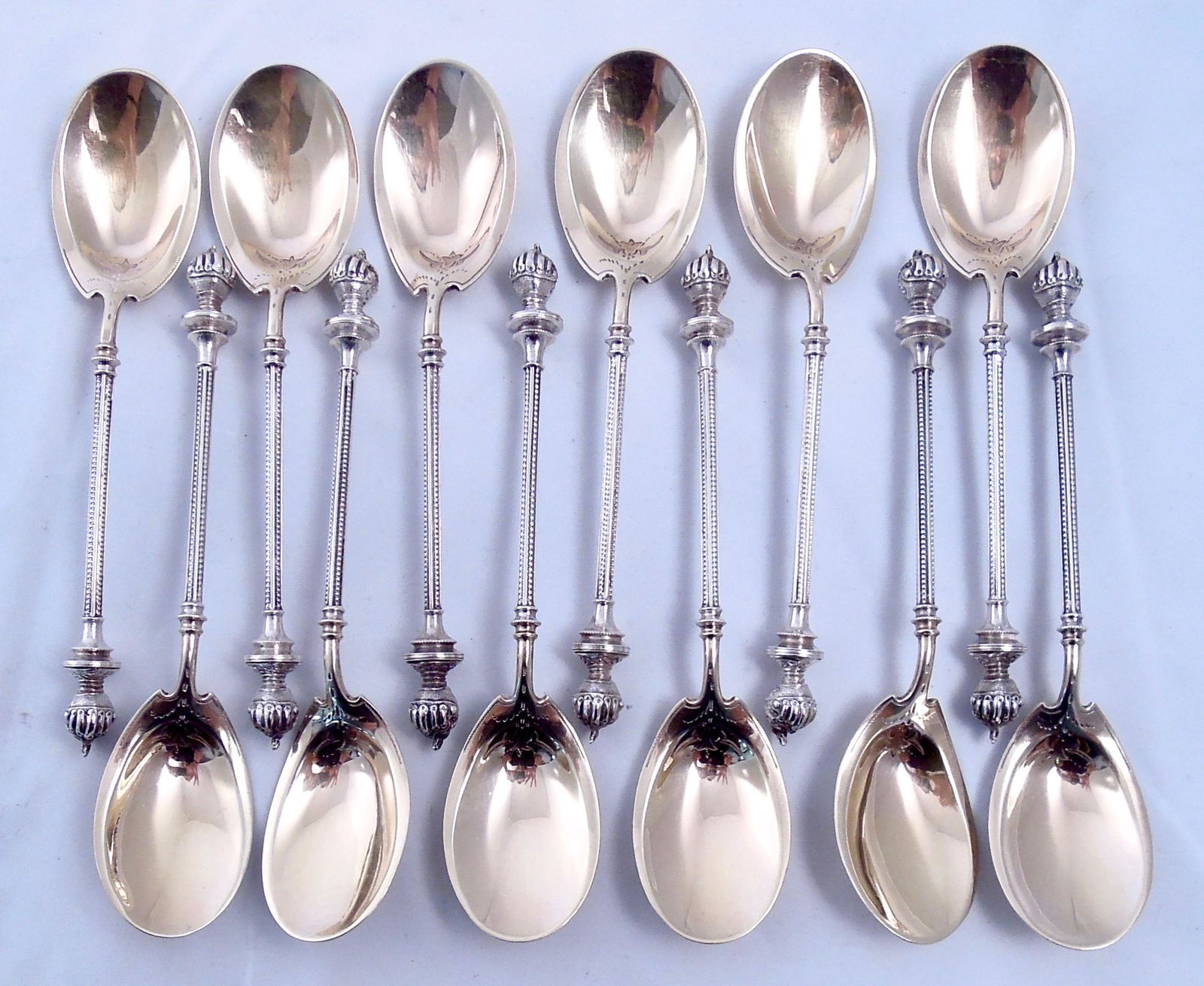 George Sharp Sterling Set 12 Dessert Spoons: Full 3 Dimensional Knights Helmet, topped with a mouse. Engraved on front and back smartly. Hallmarked as shown. 5 1/2" long. 8.3 troy.