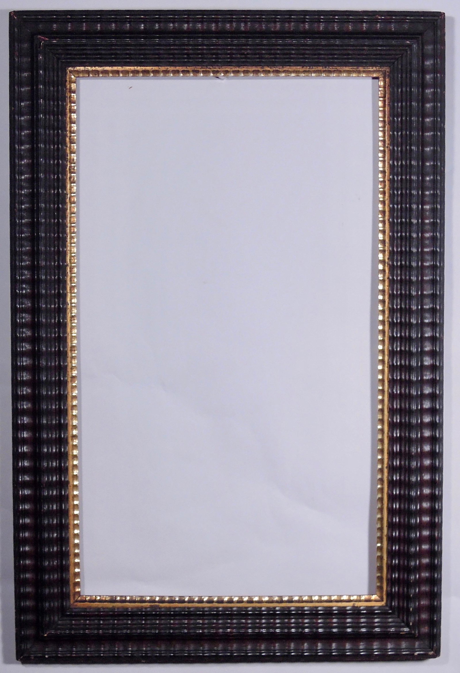 American Ripple Molded Ebonized Frame: American, ca. 1850, ebonized ripple molding with lemon gold ripple liner. Rabbet: 14" x 24" Overall Dimensions: 19 1/2" x 29 1/2" Molding Width: 3"