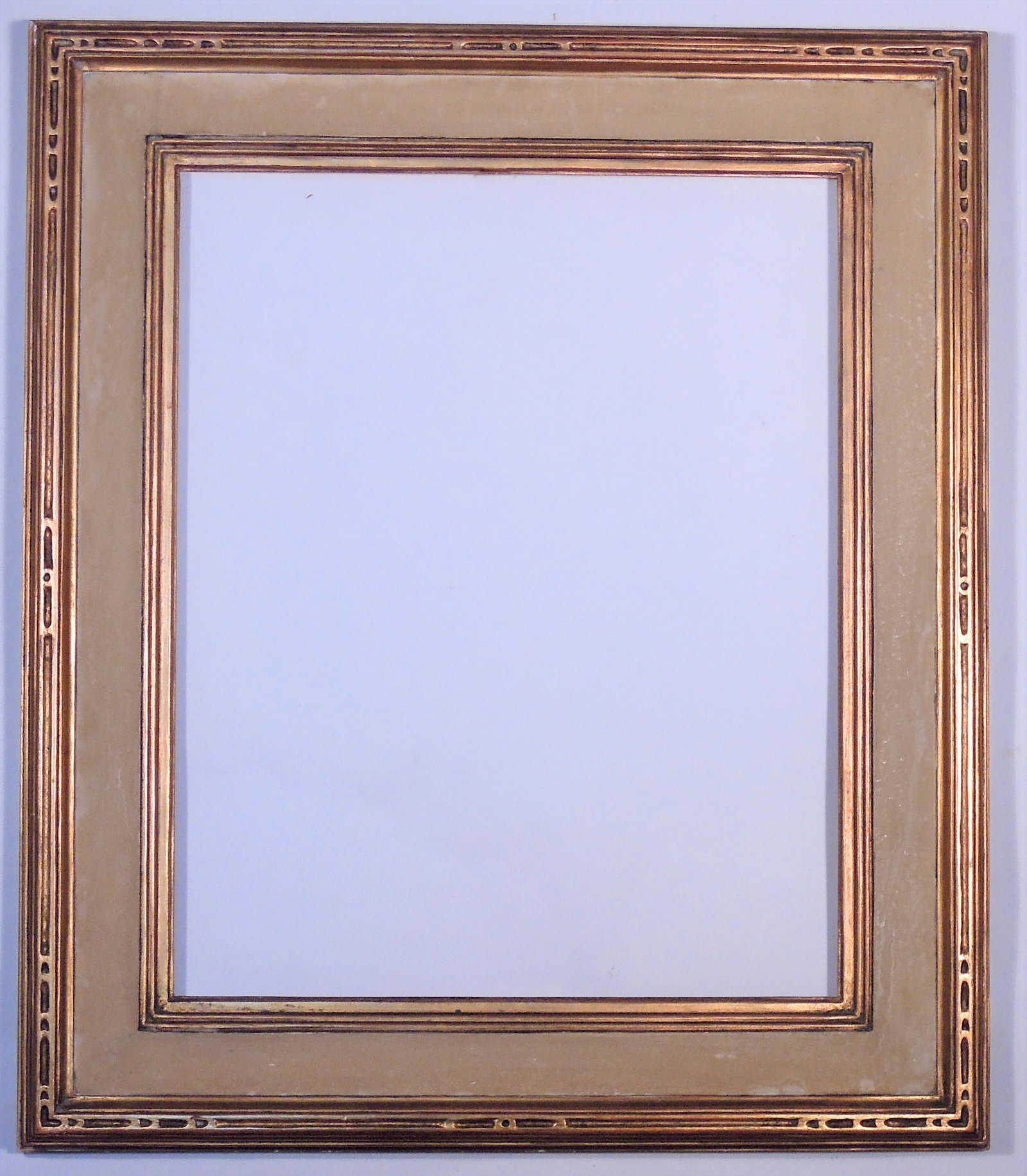 Arts & Crafts Gilt Frame By Royal Art: Royal Art, NYC, ca. 1915. Hassam style cassetta frame with ivory painted panel and intricate carving. Rabbet: 15 1/2" x 19" Overall Dimensions: 22" x 25 1/2" Molding Width: 3 1/2"