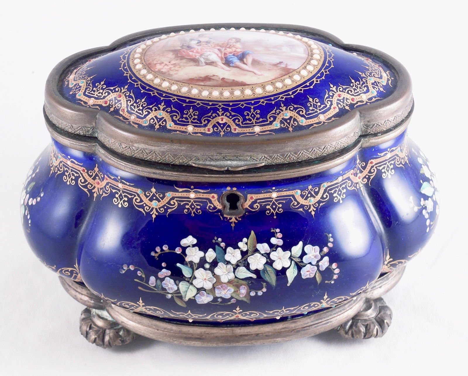 Enamel & Porcelain Dresser Box: Dark Cobalt field with enamel floral jeweling. Courting Scene on top. Silver gilt mounts and cushion interior. 4 1/8" x 6 1/4".