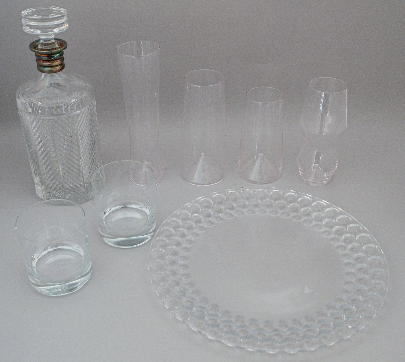 Ralph Lauren Decanter and Tiffany Crystal Platter: Large Ralph Lauren Decanter with silver plate applied on neck in herring bone pattern and marked on bottom. Tiffany platter marked on bottom. Together with Robb Vices boxed set, decanter 11 5/8" high,