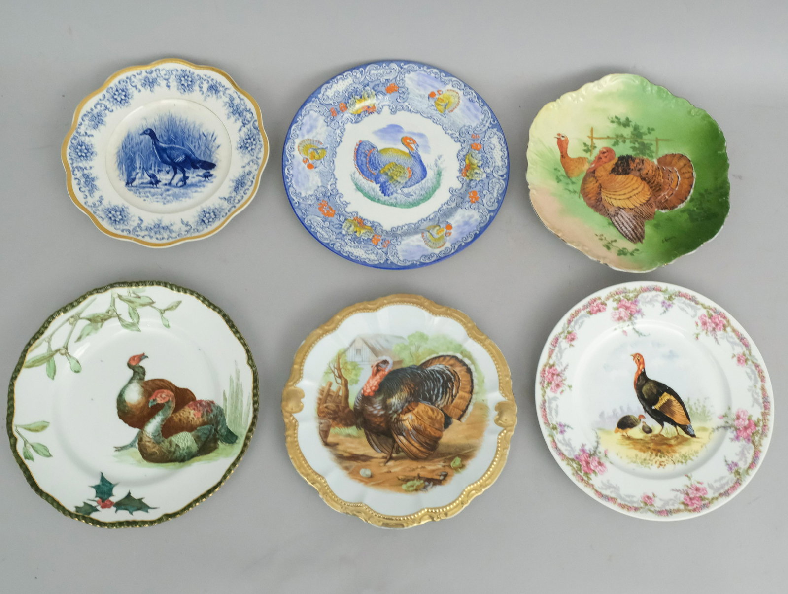 Group of 6 Turkey Motif Dinner Plates: Consisting of Plates by Doulton, Bavarian, Limoges, Wellsville, and 2 others. Largest 10 1/4" diameter.