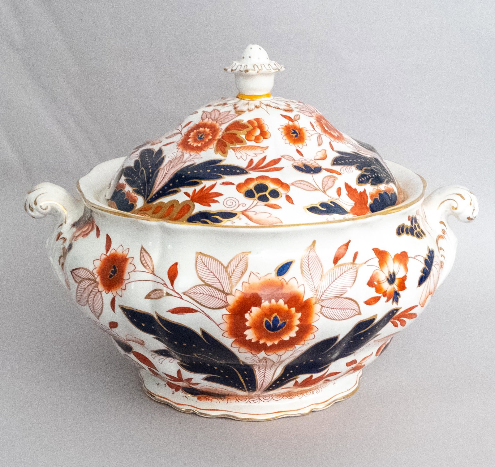 Booths Dovedale Pattern Porcelain Soup Tureen: Antique tureen decorated in Imari palette with floral motif and gilding. Scrolling handles and blooming finial. Marked as shown. Measures 9 1/4" x 13".
