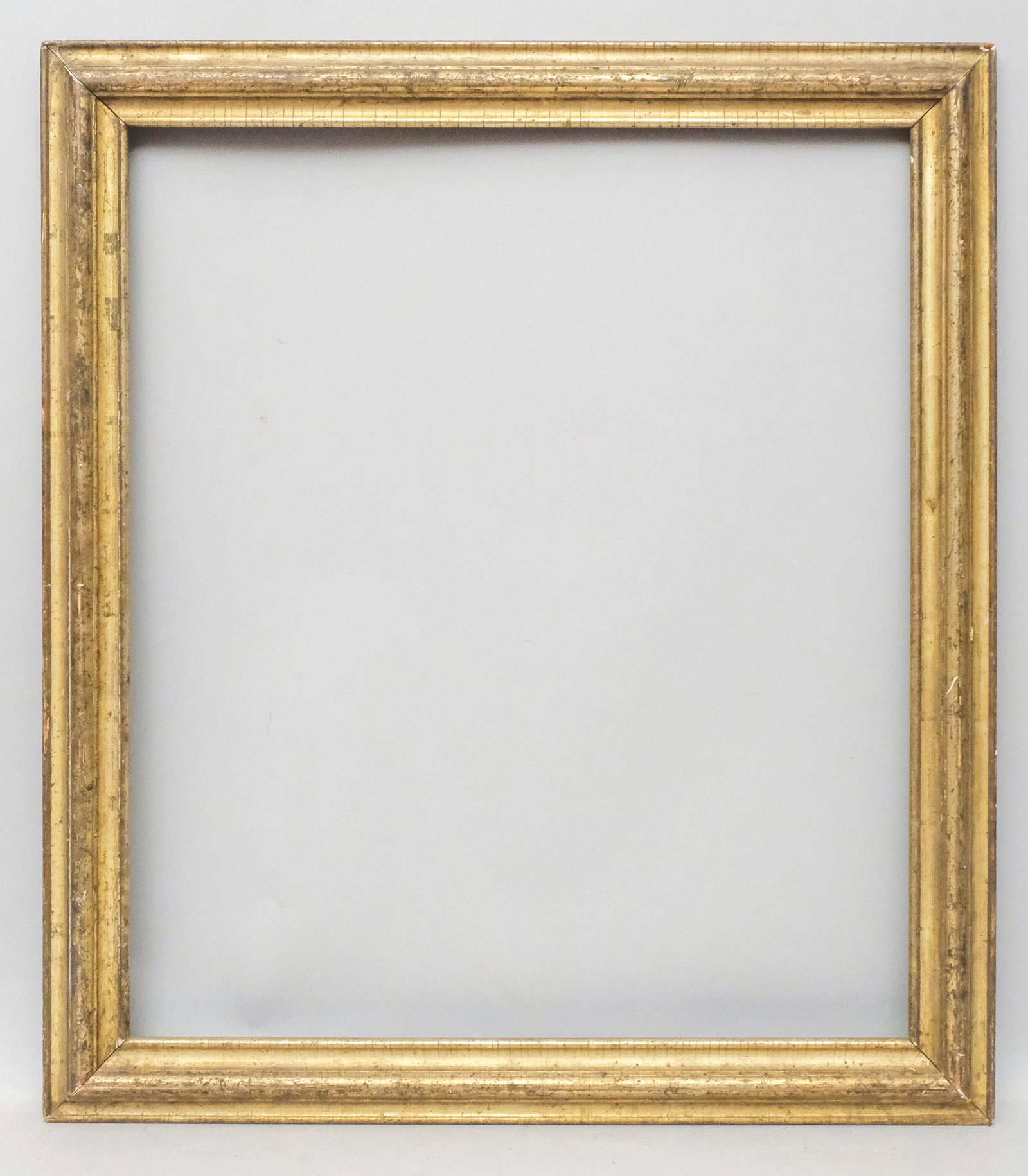 American Lemon Gold Frame: American circa 1850. Bolection molding with lovely patina, rabbet 27 1/2" X 32" overall 32 1/2" X 37" molding width 3"