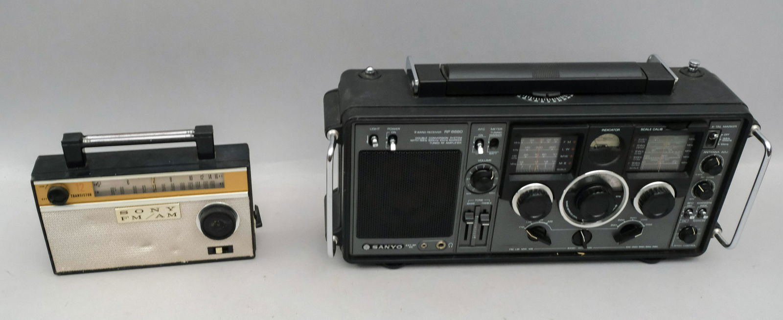 Sanyo RP 8880 World Receiver & Sony TFM 121: 18 1/2" x 5 1/2" x 11 3/4" and the Sony 9 1/4 x 6 1/2" x 2 3/4".