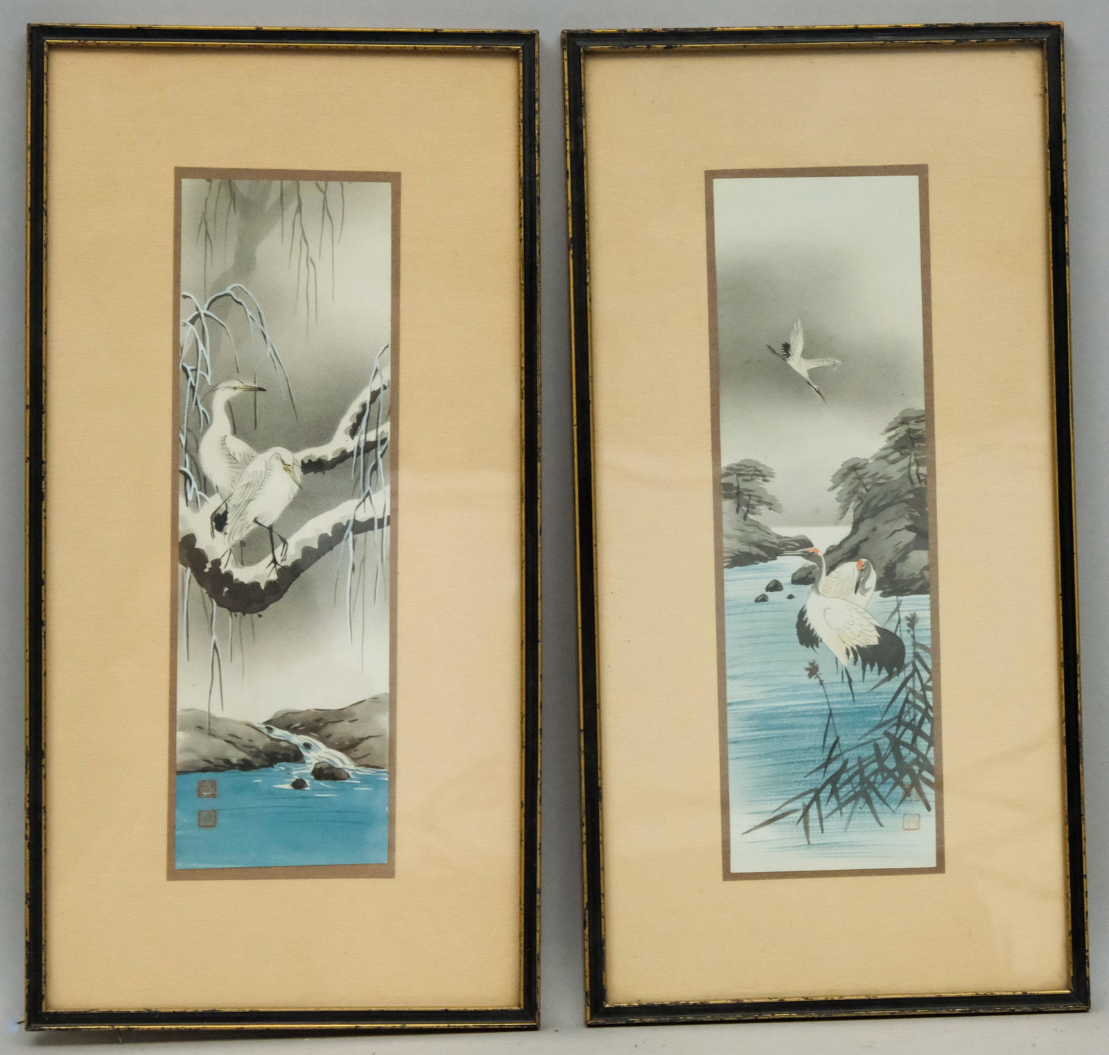 Pair of Chinese Watercolors, Cranes: Chinese, early 20th century, watercolor on paper depicting cranes on snow-covered branches, signed with characters, approximately 3" x 10" paper size, 7 1/4" x 14 1/4" framed.