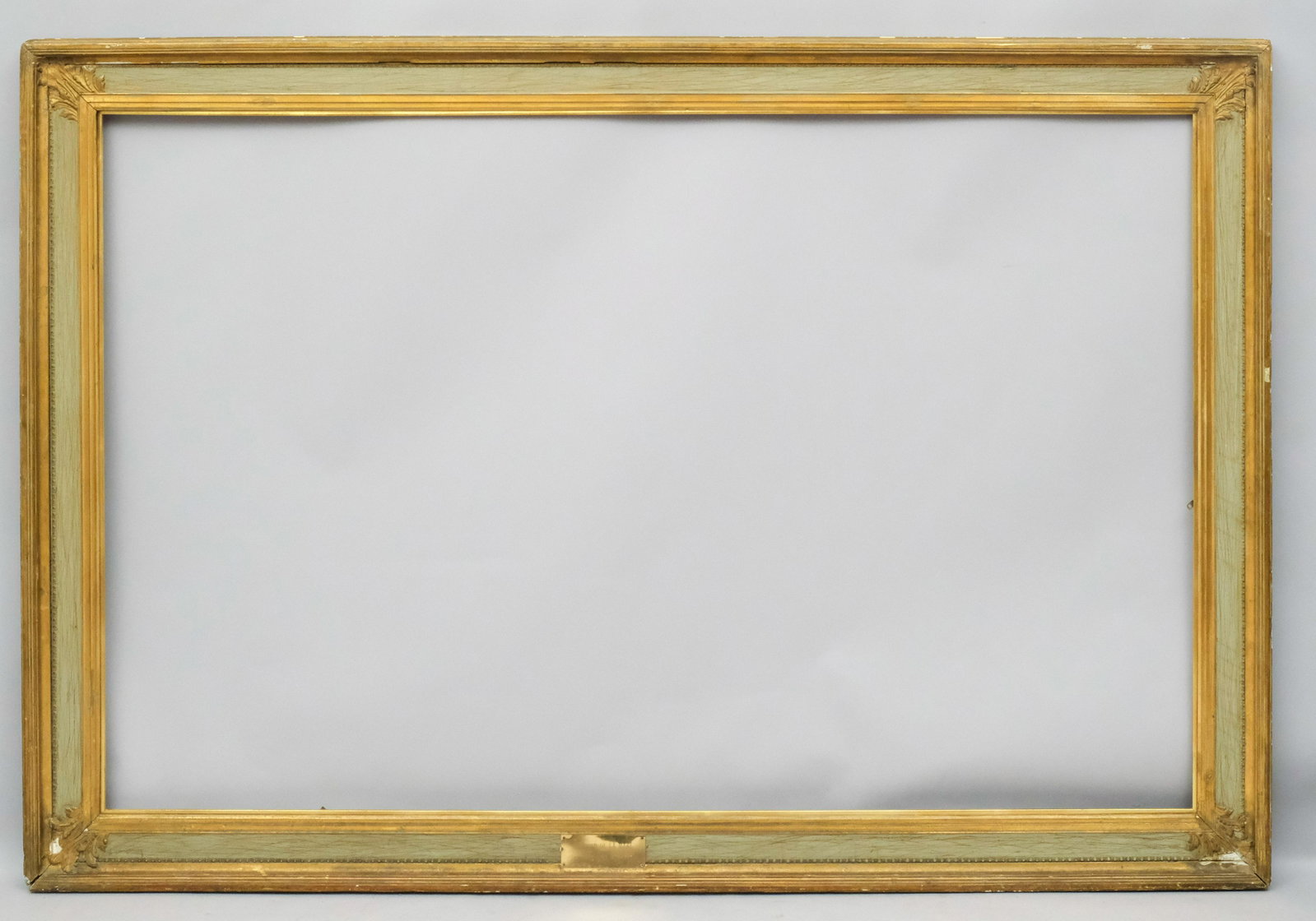 Large Pre-Raphaelite Style Frame: American or English, ca. 1890, having flat panel and acanthus corners, similar to the Watts style frames of the period. Rabbet 44" X 69" overall 53" X 78" molding width 4 3/4"
