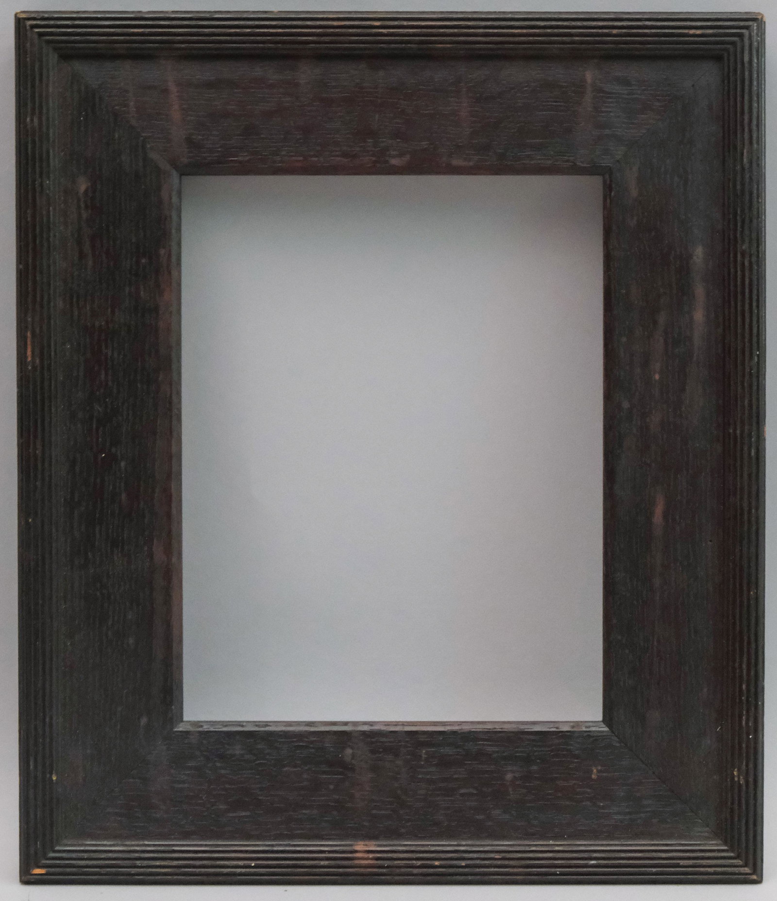 Whistler Style Quartersawn Oak Frame: American, ca. 1890, having reeded top edge, likely made by Foster Bros. Rabbet: 7" x 9" Overall Dimensions: 11 1/4" x 13 1/2" Molding Width: 2 1/2"