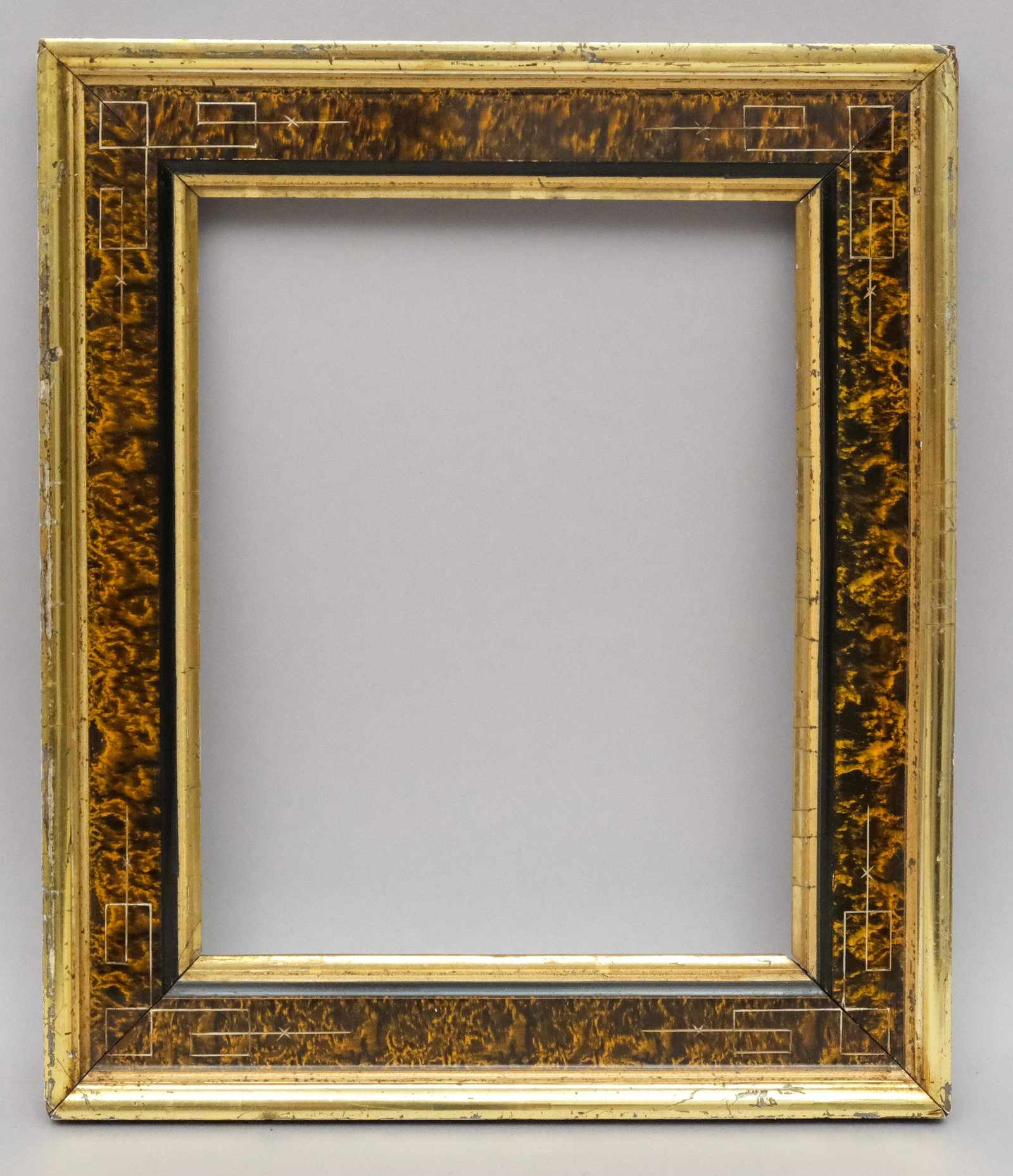 American Eastlake Lemon Gold and Faux Bois Frame: American, ca. 1870, gilded and incised in a great standard size. Rabbet: 8" x 10" Overall Dimensions: 11 3/8" x 13 3/8" Molding Width: 2"