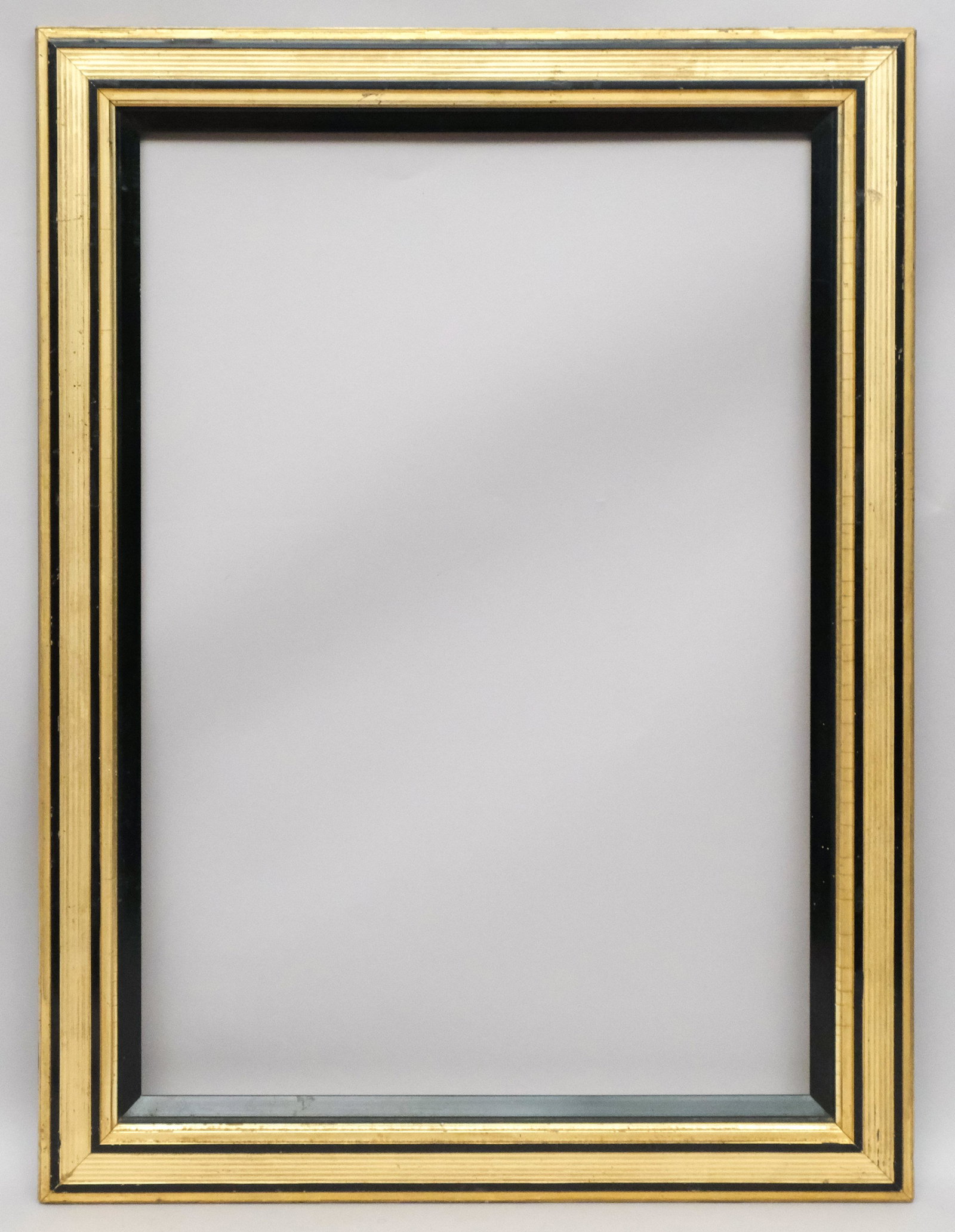 American Lemon Gold Gilt and Ebonized Frame: American, ca. 1860, flat reeded profile with ebonized accents and liner. Rabbet: 22" x 31 1/2" Overall Dimensions: 28 1/4" x 38" Molding Width: 3 1/4"