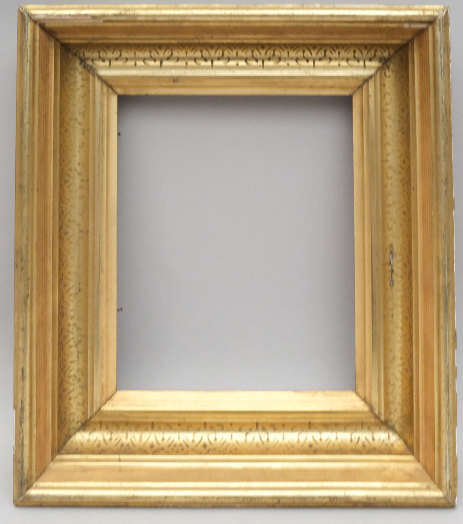 American Lemon Gold Stenciled Frame: American ca. 1860 cove profile with stencil decoration. In a great standard size. One of a pair with lot 178. Rabbet 8" X 10" overall 13" X 15" molding 3"