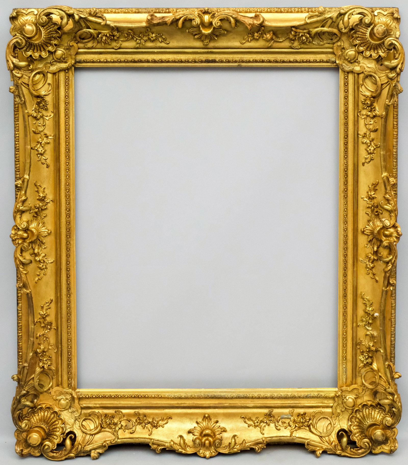 American Baroque Revival Frame: American, ca. 1840 having foliate decoration and impressive scale in a great standard size. Rabbet 29" X 36" overall 42" X 49" molding width 6 1/2"