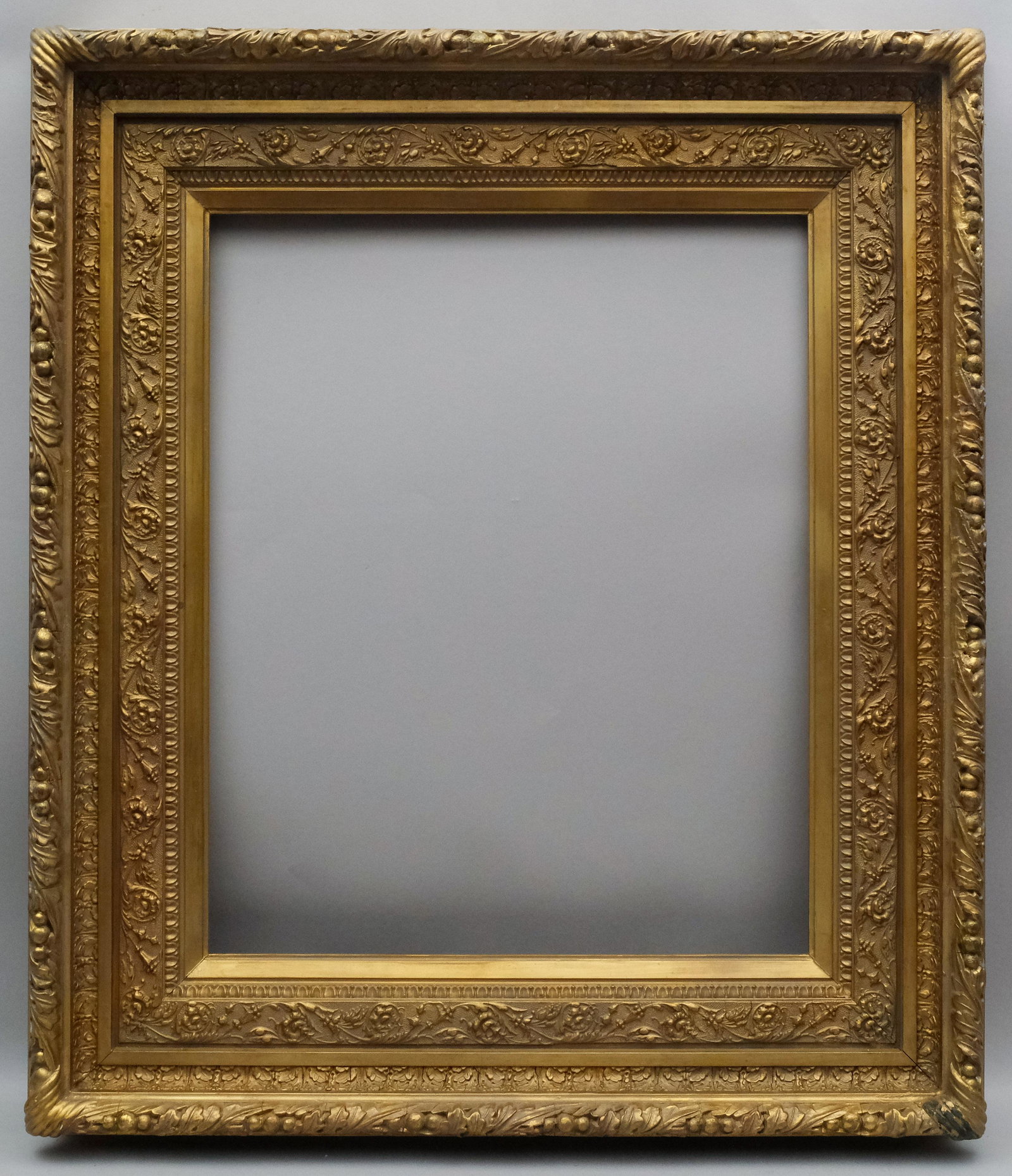 American Hudson River School Gifford Frame: American, ca. 1880, having decorative top edge and acanthus cove with panel liner of the style favored by Sanford Gifford. Rabbet 22" X 27" overall 33 3/4" X 39" molding width 6"